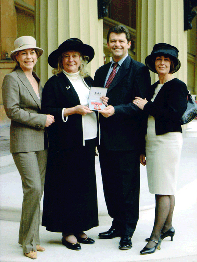 Mary Cornelius-Reid receiving an MBE